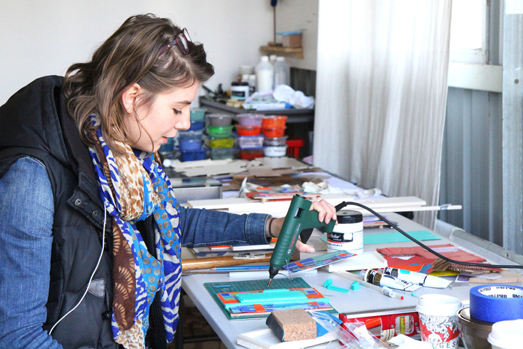 Artist in Residence Sanne Koelmeij creating her colour field collage 'drawings'