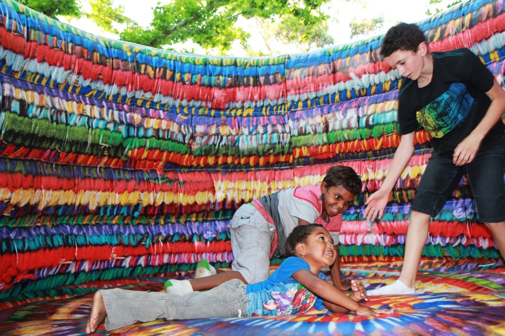 Giant interactive inflatable Martu bouncy basket, based on a woven basket by Thelma Judson. From the exhibition We don’t need a map: a Martu experience of the Western Desert, 2012-13. Photogrpah by Bo Wong