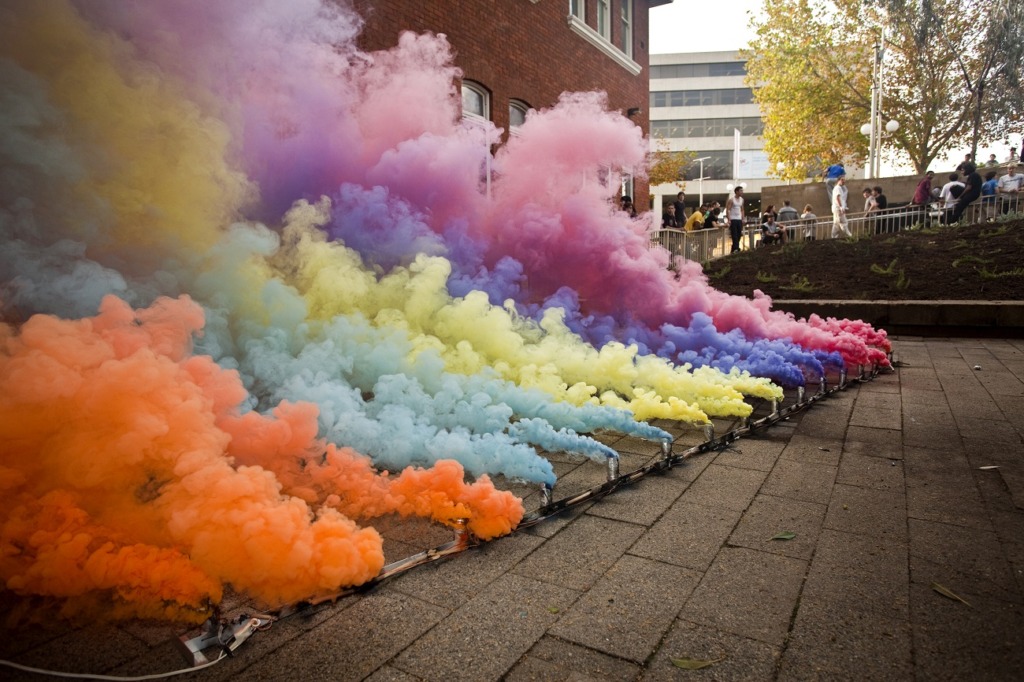 Rebecca Baumann, Improvised Smoke Device, 2010, 15 smoke canisters, 825m3 coloured smoke, aluminium, foil, wire, black powder, quick match fuse, 5 minute performance, Perth Cultural Centre. Photograph by Bewley Shaylor