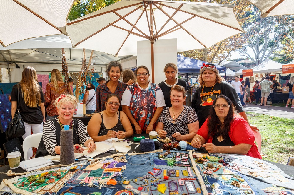 Artists from the Langford Aboriginal Association, Perth at the 2019 Revealed Art Market, Fremantle Arts Centre. Photography by Jessica Wyld