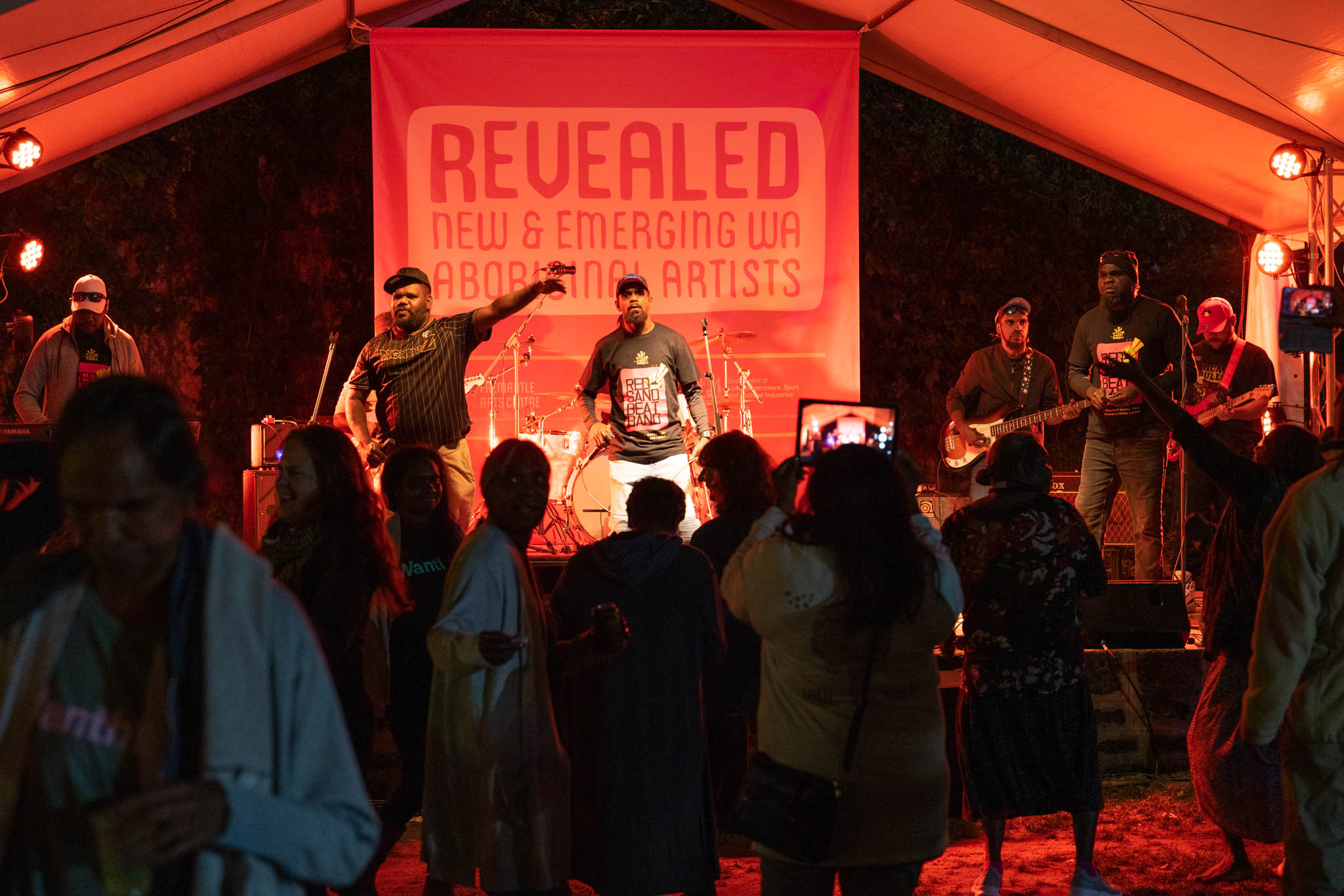 Ngaanyatjarra musicians the Red Sand Beat Band, performing at the 2021 Revealed opening. Photography by Pixel Poetry